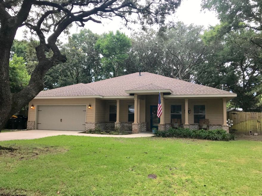 Gorgeous Craftsman style home in Elliott Point area of Central Fort Walton Beach. Park like setting with majestic oak trees. Nice covered front porch and screened in back porch. There is a formal dining room, large kitchen with an abundance of cabinets, granite counter tops with a breakfast bar that can easily accommodate four. The great room has triple windows and looks out to the beautiful shaded backyard. There is plenty of privacy with the split bedroom plan. The spacious master bath has double closets, soaking tub, separate shower and dual vanities. The two additional bedrooms are large and share the additional bathroom. There is crown molding and 11 foot ceilings throughout the home. Backyard has a tree house, lots of shade and a side gate that can accommodate a boat or RV.