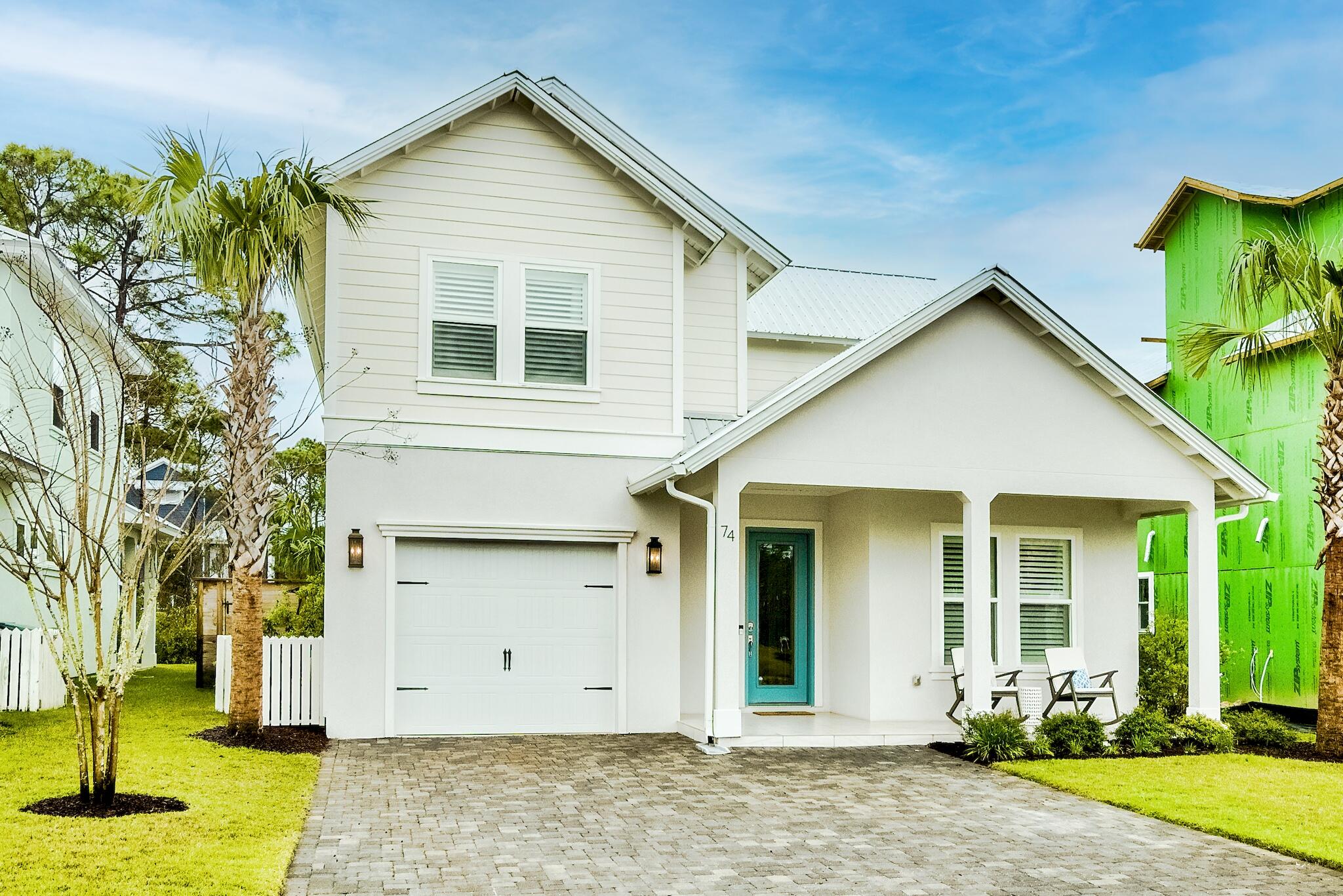 Located in Frangista Beach with a PRIVATE HEATED POOL! This beautiful home has never been rented but would be a great investment property with rental projections in the range of $112- $152K! Built in 2019, this home is 2 stories, 2371 square feet, 4 bedrooms, 3.5 baths and has a 1 car garage! The backyard is a wonderful oasis with a covered porch with porcelain tile, a privacy fence, brick pavers and lush landscaping. In addition to adding the 5 x 14 private pool, the owners have installed rain gutters and plantation shutters in all windows. Built on a slab, protected by weather resistant tyvek house wrap, metal roofing, moisture tolerant engineered hardwood flooring, a sentricon termite bond and impact resistant windows and doors! The kitchen boast KitchenAid stainless steel