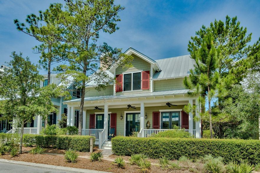 Located in a quiet corner of WaterColor's desirable Long Leaf Park neighborhood adjacent to the state forest, this amazing Phase 3 home is for sale, rental-ready and being sold fully furnished. With five bedrooms including two master suites, fully appointed carriage house, and cozy bunkroom, this four-and-a-half bath, two-car garage home also includes a spacious screened entertaining porch with fireplace between the main and carriage houses. High end appliances and fixtures and hardwood floors run throughout the entire home. The living area includes handsome wainscoted walls and a stone gas fireplace, while the kitchen features a large granite center island and quartz countertops to go along with its large gas range and other stainless appliances. A half bathroom sits just off the dining area, as does the hidden stacked washer-dryer neatly tucked under the stairway that leads to the second floor. A spacious master suite completes the first floor, with a master bath that features a large glass shower with separate tub, dual vanities, and tile floor. Upstairs are two large bedrooms, two baths (one en suite), a bunk bedroom that sleeps four, and an inviting reading nook. The large screened porch with its own fireplace connects the carriage house and garage to the main house, with ceiling speakers that make it a great entertaining space. And right outside the screened porch is a secluded, landscaped patio that's perfect for all your grilling needs.

The charming carriage house, an ideal oasis for guests or family, has been fitted with retro appliances and features a full kitchen, living area, and wainscoted private bedroom with a small furnished balcony that looks out to Point Washington State Forest.

You are just a few minutes' walk from all that WaterColor and Route 30A have to offer the brand new Camp WaterColor, iconic Frog Pool, the amenities of Western Lake Boathouse, and WaterColor Town center and your own private Beach Club on the Gulf. You can also enjoy walking, biking, or taking a quick golf cart ride to Publix grocery store and all the surrounding shops and restaurants of WaterColor, Seaside, Grayton Beach, and Seagrove Beach.

WaterColor Homeowners Association dues total $1,590 per quarter, including $330 per quarter for the next 13 years to cover a special assessment first introduced in January 2017 to pay for the expansion and remodeling of WaterColor Beach Club and Camp WaterColor and $1260/qtr HOA dues include cable and internet. Also, there is a fee of 0.5% of the purchase price paid by the buyer due at closing to the St. Joe Foundation, along with a $75 buyer transfer fee to the HOA. Square footage was recently measured in an insurance appraisal, but it and room dimensions are approximate and should be verified by the buyer.