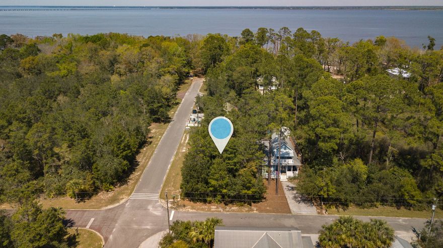 Beautiful and wooded 50 x 150 corner Lot in Point Washington! Property is in a calm family neighborhood close to the Choctawhatchee bay, but not in a flood zone. Excellent place to build your dream home within 10-15 minutes to Grayton Beach and the beaches of 30A. Local amenities include public picnic, dock and paddle board launch, and a small neighborhood boat ramp leading to the bay. NO HOA. Buyer and buyers representatives to verify all information.Wooded lot with beautiful scrub oaks and sand pines, possible bay view/peeks, X flood zone, ready for your family to build a beautiful home with plenty of room.This neighborhood area is becoming more and more popular, so consider buying now!