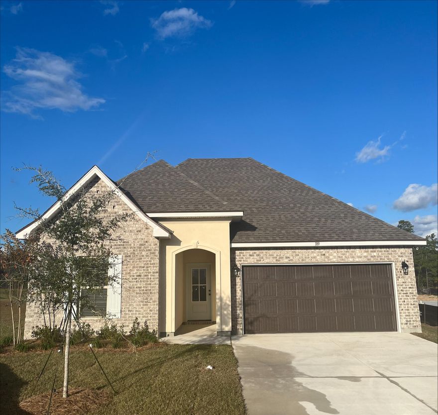 The TRILLIUM IV A in The Bluffs at Lafayette community offers a 3 bedroom, 2 full bathroom open and split design. Upgrades added (list attached).Special Features: double vanity, garden tub, separate shower, and walk-in closet (opens to laundry) in master suite, kitchen island, walk-in pantry, covered front and rear porch, boot bench in mudroom, recessed lights, crown molding, ceiling fan in living and master,  custom framed mirrors in bathrooms, undermount sinks, landscaping, architectural 30-year shingles, flood lights, and more!Energy Efficient Features: tankless gas water heater, kitchen appliance package with gas range, vinyl low E windows, and more! Energy Star Partner.