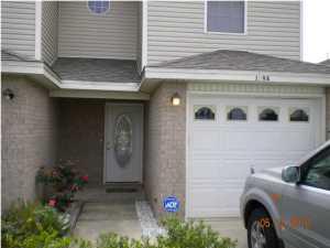 This is an end unit and features a 6' wood fence, private patio, beautiful entry, and a one car garage with automatic remote. The location is quiet and off the main drag eliminating road noise etc. This home is close to shopping, movies the mall and located conveniently. Don't miss this immaculate rental opportunity. Two bedroom 2 1/2 bath home.
