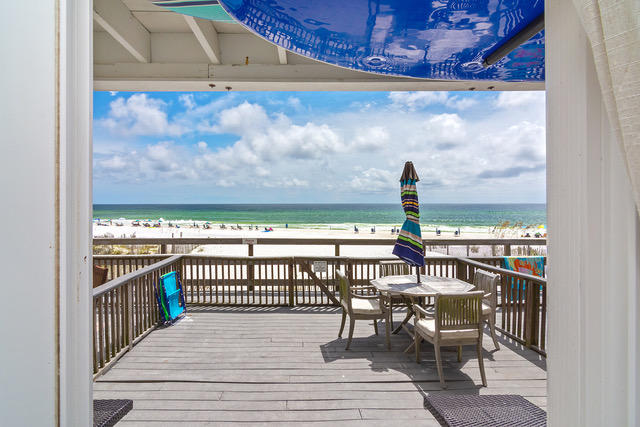 WALK OUT UNIT 1st Floor GULF FRONT LEEWARD II Condo, furnished. Almost $50k gross in rentals in 2017. Huge spacious deck, and the beach is deeded all the way to this water line for this condo complex. New water heater with warranty, 1 year old AC unit. Only 9 units in the building. Sold Furnished can sleep six with king bed, set of bunks pull out sofa. HOA fee includes insurance, Exterior of building, Water, TV cable and internet. Owner uses about a month each year RENTALS