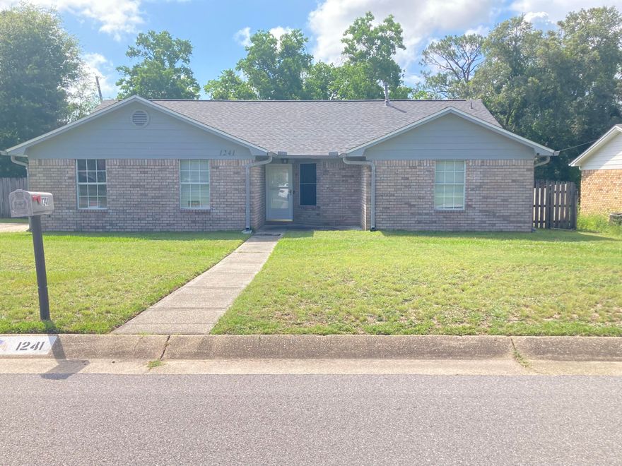 Near to the beaches & NAS Pensacola. Welcome to your beautiful Ranch home (Corner Lot) in Woodbridge Manor. Enjoy a ;large primary bedroom with an en suite bathroom featuring a walk in shower.  The  split floor plan was recently upgraded with new vinyl plank flooring in all bedrooms & tile through the rest of the house. Enjoy the open kitchen area that flows into the great room and dining area. This has been freshly painted. Fenced in backyard and large concrete patio area (42 x 14). New Roof 2021, New HVAC 6/22, New gas water heater 11/22, New walk in shower 2022.