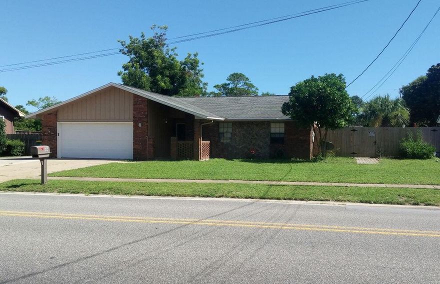 This three-bedroom, two bathroom home is located in the heart of Destin. It has a large closed in bonus room on back, Living room has vaulted ceiling with fireplace. New vinyl plank flooring throughout, expect foyer which has tile.  Both bathrooms have been newly renovated.  It has a pool and an additional covered deck (11 x 25.5) area which is wired for a TV and speakers outside, to enjoy football season while cooking out by the pool. The luxurious kitchen features new kitchen cabinets and stainless steel appliances, and solid counter tops. Other upgrades include vinyl plank flooring throughout, both bathrooms have been completely renovated with beautiful tile work.  Large driveway with side section for a boat!!!! This one will not last. This home is must see!
