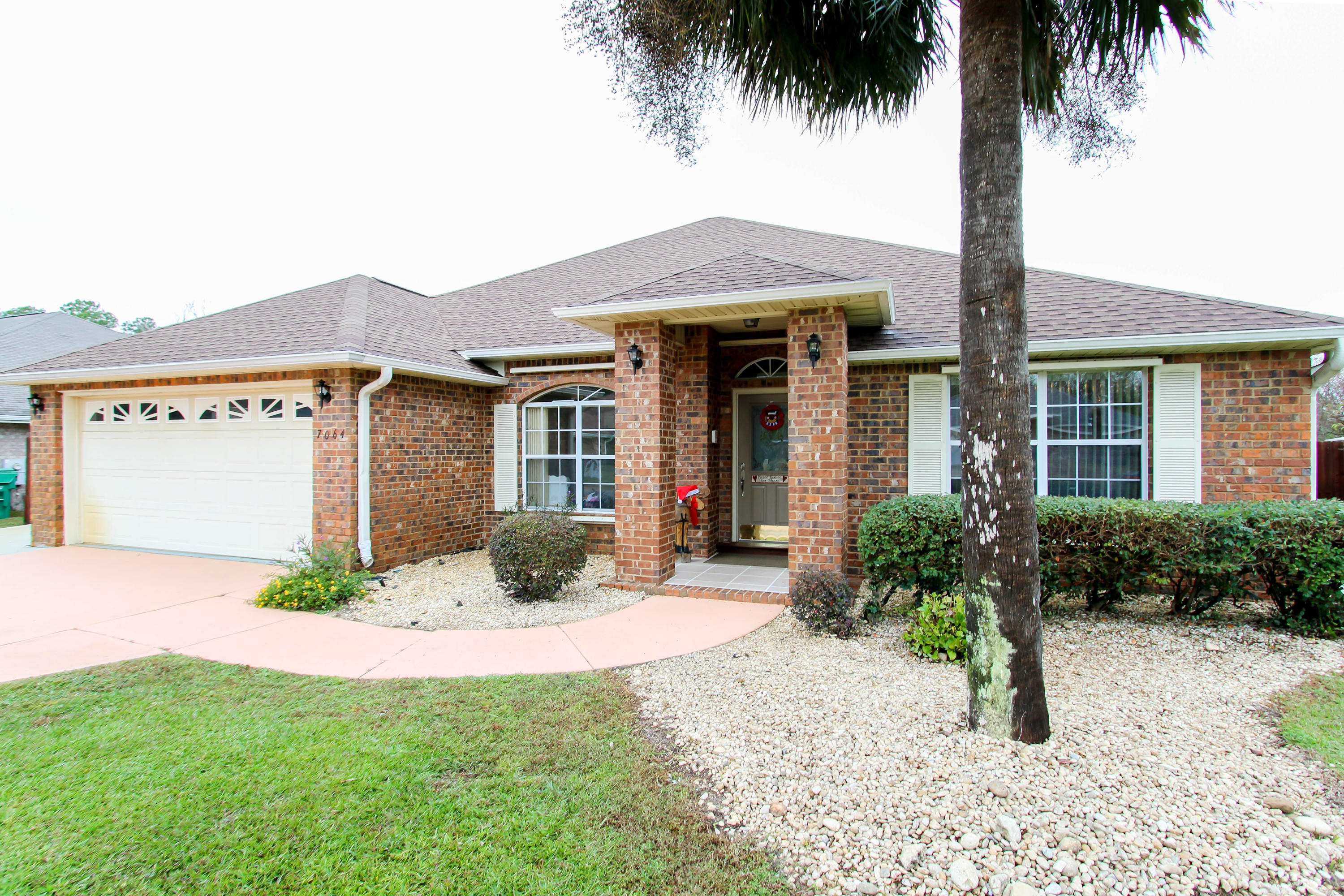 Enjoy this captivating open floor plan with wood floors throughout, including sizable eat-in kitchen and a separate formal dining room. This spacious 4 bedroom home features a large office and sunroom. Outside features include an outdoor shower for those sandy days at the beach, along with a storage shed to hold any overflow garage items. Pull into this expanded driveway to your new home, kick off you shoes, relax, and enjoy all the upgrades this house has to offer.