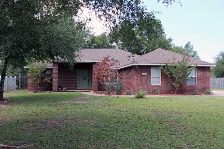 Better than new! This kitchen has been updated with NEW granite counter with glass tile backsplash, NEW stainless steel appliances with updated lighting and faucet . Split bedroom plan. The master bedroom has trayed ceiling and full bath with separate shower and soaker tub. Outside you will find a fabulous deck with fire pit to enjoy the outdoors. Fabulous NEW Gunite pool. Shed for the handyman. Side entry garage. NEW high efficiency Air Conditioner. Underground invisible fencing for your pets. Enjoy the privacy of living in the country and yet only minutes to town and Duke Field. Come see this fabulous home today!