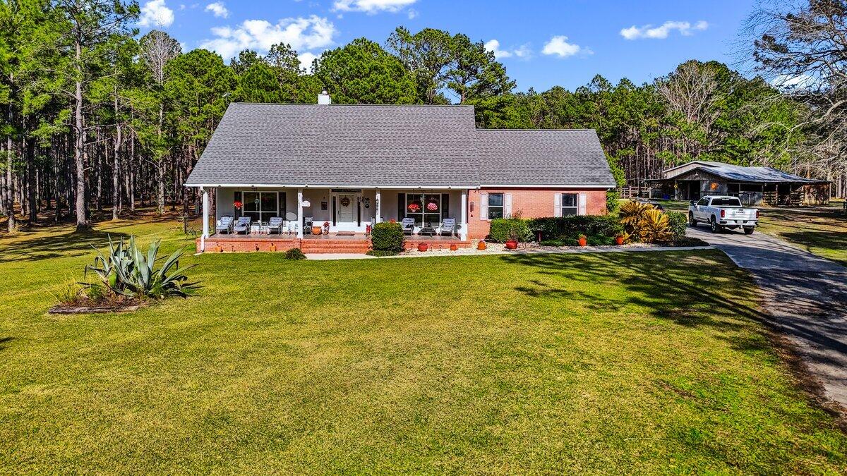 A Horse Lover's Dream on 70 Stunning Acres! Welcome to an extraordinary 70-acre estate, offering endless possibilities and the ultimate retreat for nature lovers, outdoor enthusiasts, and equestrians alike. This breathtaking property has a perimeter fence around all 70 acres, with additional cross-fencing for rotational grazing, making it ideal for horses or other livestock. Explore miles of scenic trails right on your own land, fish in your very own stocked pond, or enjoy a night under the stars at your private campsite--complete with a camper that conveys with the property. Three natural springs run through the land, creating a picturesque and serene environment where wildlife thrives.