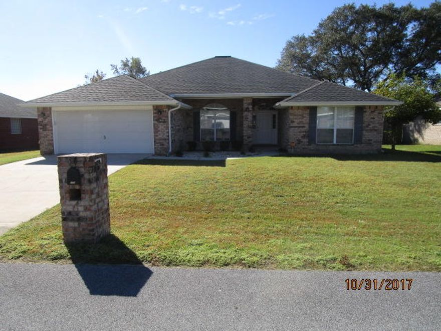 Wonderful split level floorplan with walkthrough kitchen, large breakfast/dining area and nice formal dining room. New A/C unit July, 2017. 3 large bedrooms on one side with large bath and double vanity. Nice master bedroom with large master bath, garden tub and separate shower. Upgraded tile in foyer and kitchen. Decked in attic for additional storage. Wrap around gutters. Fenced in back yard with storage shed and patio area. Newly installed back storm door. Plant ledges, Fire place and the Refrigerator. Call Travis today for Appointment to see it