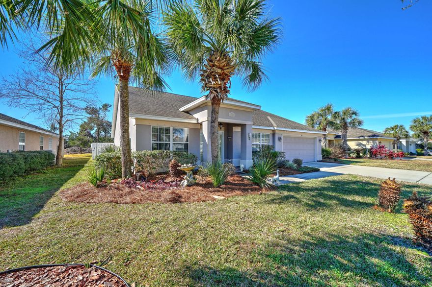 4 bedroom 2.5 bath home in popular Palmetto Trace. The interior features 2 living areas, separate dining room, eat-in kitchen with breakfast bar. Large master suite with room for sitting area, master bath includes 2 walk in closets, large vanity with double sinks, and walk-in shower. The home also offers 3 additional bedrooms and bathroom on the opposite side of the house. The great room also has sliding door access to the patio and deck area in the fully fenced backyard. The house also includes a 2-car garage, Sprinkler system using reclaimed water, & hurricane shutters. Palmetto Trace has sidewalks throughout, underground utilities, and two community pools.