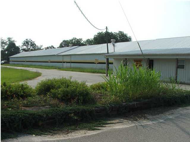 Great Location for business for a rapidly growing area.Huge potential for a customer base as it has easy access to the Panhandles and South Alabama major points 30 Minutes from Crestview, 45 Minutes from Destin and all the local bases ( Eglin, Hurlburt, Duke, 7th), One hour from Pensacola.22.7 acres of Industrial land with a 14,870sq ft building. Bld is ready for just about any business & also has 3 phase power. Approximately 1100 sq ft is heated and cooled in office space; approximately 1000 sq ft heated and cooled break room & storage. Approximately 1000 sq ft block building for storage. There is room for a small Industrial Park. 756 feet of Highway 85A frontage & 40,000 sq ft of pavement.