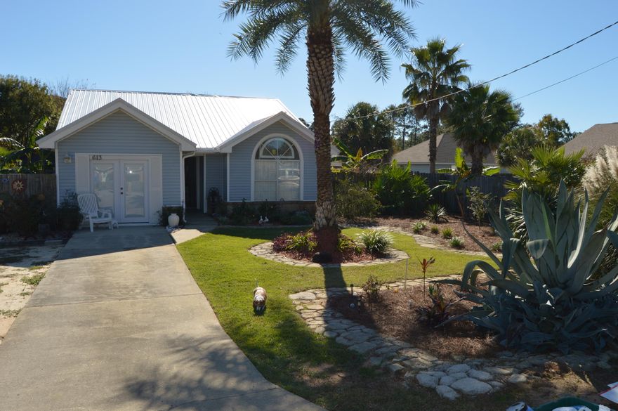 Great Home with open floor plan just minutes away from Hurlburt. Cathedral ceilings in living room and master bedroom. Converted garage can easily be used for additional family room or bedroom. Lounge in your large screened-in patio or jump into your pool. Large workshop for additional storage. Metal roof and vinyl siding are just some of the pluses to this lovely home. Call today for showing appointment.