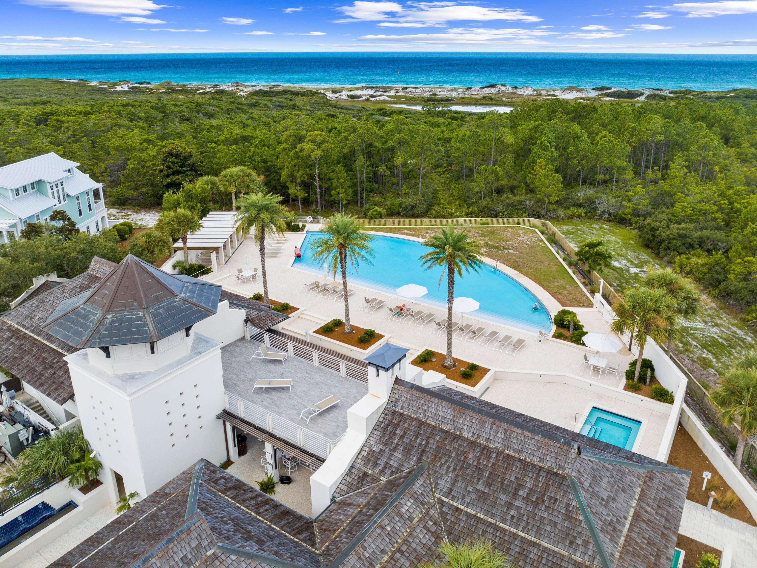 Extremely well-maintained four-bed, three-bath home in the Cypress Dunes community along 30A. Spanning 2,300 square feet, this ''Cypress'' floor plan residence is situated in Phase II and offers a seamless blend of elegance and comfort. The first floor features a one-car garage, a gourmet kitchen, a dining area, a family room, a powder bath and a master suite with 10-foot ceilings. Upstairs, you'll find three additional bedrooms and two baths. Nestled on a serene, semi-private lot that backs up to a nature preserve, this home boasts a spacious, open floor plan with solid walnut flooring and granite countertops in the kitchen. Recently upgraded with all new appliances, new HVAC and re-stained porches to the front and rear, this property has been meticulously maintained as a second home. Cypress Dunes offers unparalleled amenities, including a stunning infinity-edge pool, hot tub, workout facility, outdoor covered fireplace, a second-floor sunset deck and an owner party room with a commercial kitchen, all overlooking the Gulf of Mexico. The community also features a second pool in Phase II, boardwalks through the Cypress Pond, tennis and pickleball courts and a plush lawn area for recreational use. Ideal for a primary residence or vacation home, this property is close to beautiful beaches, shopping, restaurants and the renowned Topsail Hill Preserve State Park. Experience coastal living at its finest in this quintessential Florida cottage, where luxury and tranquility meet.