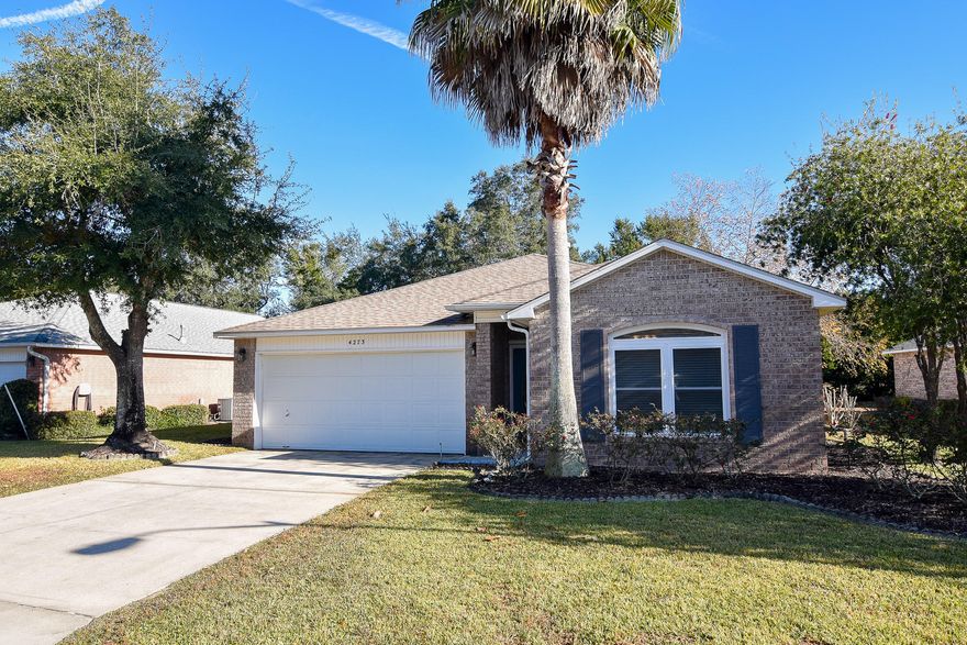 A must see, beautiful all brick 3 bedroom 2 bath home with a HUGE bonus room. NEW ROOF being put on, to be completed in March 2020! Home features an open floor plan with many modern upgrades. The spacious kitchen with granite countertops and kitchen island open up to a beautiful living room with vaulted ceilings and a gas fireplace. The open living space leads to a 12'x20' Heated/Cooled Florida Room with access to the attached screen enclosed patio. Lots of upgrades throughout! 15 Vinyl Windows (with impact glass) and 2 Vinyl Sliders replaced 2013. Large front window replaced in 2017. Storm shutters for sliders, doors, and non impact windows included.