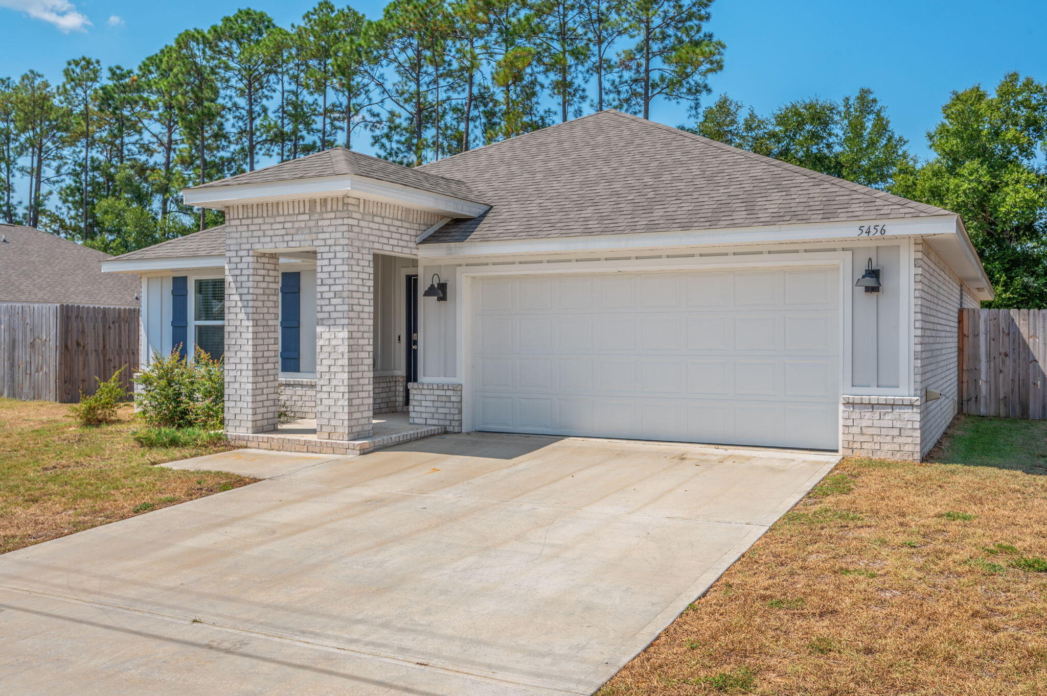 Welcome to this beautifully maintained 4-bedroom, 2-bath home offering more than 1,800 square feet of comfortable living space on a spacious 0.30-acre lot. Designed with both function and style in mind, the home features an open layout that connects the living room, dining area, and kitchen--perfect for relaxed family living or entertaining guests. The kitchen stands out with its bright cabinetry, large center island, and convenient breakfast bar, creating a natural gathering spot. The split-bedroom design ensures privacy, while each room offers plenty of space and comfort. Outdoors, enjoy a covered patio that overlooks a fully fenced yard with mature trees, providing both shade and tranquility. With its balance of indoor comfort and outdoor charm. Property is located at the end of a dead end street providing limited through traffic as well as nearby schools.