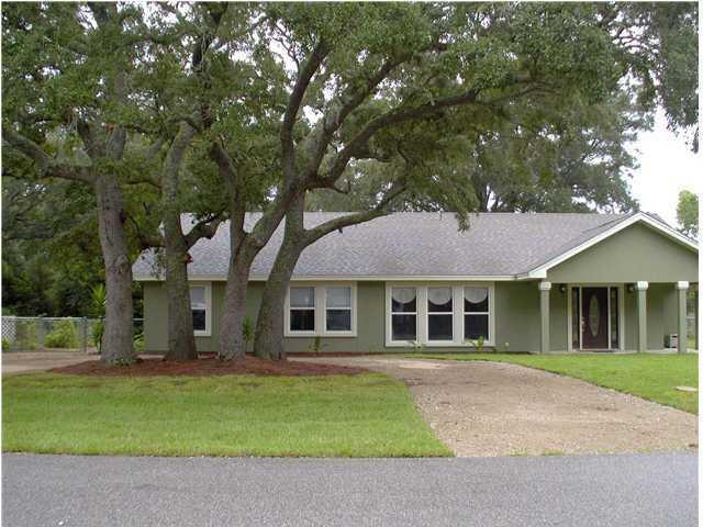 ABSOLUTELY STUNNING BETTER THAN NEW HOME. Home has been completely rebuilt in 2008. Brazilian Teak Hardwood flooring, Travertine marble/stone entry, double tray ceilings, crown molding and decorative baseboards throughout, designer light fixtures and recessed lighting, custom travertine / stone bathroom with large cultured marble tub, furniture vanity, travertine vessel sink, designer Brizo faucets, Custom Kitchen with travertine / stone floor, Silestone counters, tumbled marble backsplash, large custom solid wood cabinets with slide-out organizers, pantry with sliding drawers, and many more marvelous upgrades throughout this home. Energy efficient bonuses include Spray Foam Insulation, heat pump with ultraviolet air cleaner and electronic air cleaner, ''ERV'' - Energy Recovery vent.