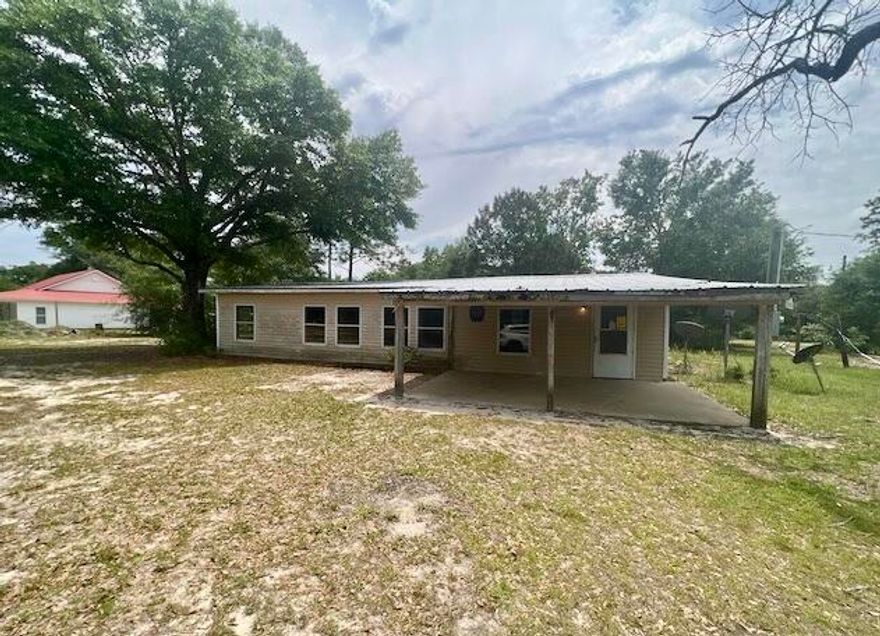 Resting on 1.29 Acres, this 3 bedroom, 2 bath this REO home has tons of potential! At approx 1390 square feet, this vinyl sided home was built in 1982, rests on a cleared flat parcel and is ready for new owners and updates. Walls are a combination of osb and drywall, home rests on a slab and the roof is metal. This property needs repairs and therefore will not qualify for financing so cash or rehab loans only at this time. Call today!