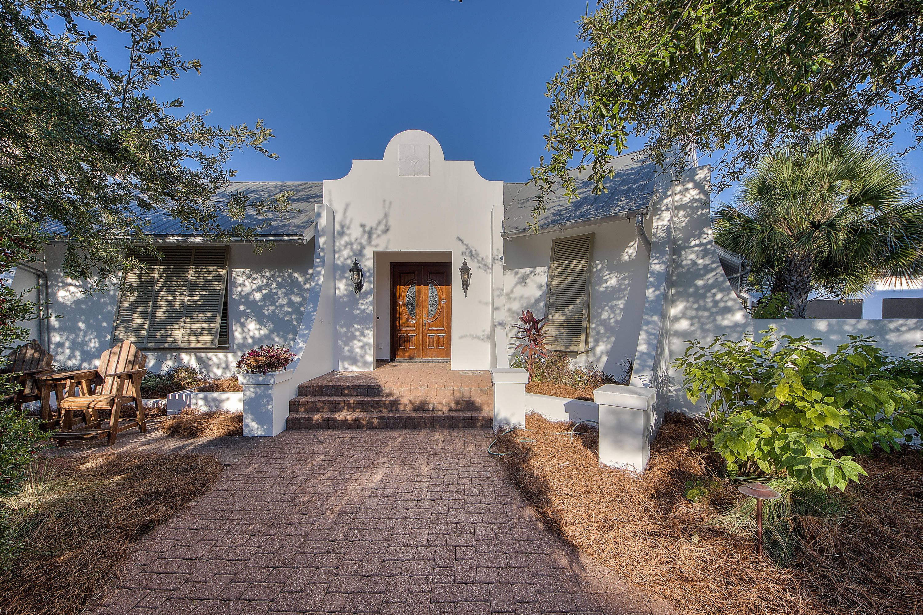 MOTIVATED SELLER! PRICED TO SELL. Home is NEWLY DECORATED & FRESHLY PAINTED EXTERIOR. It is EXTREMELY RARE to find a ONE-LEVEL home on one of the LARGEST LOTS in ROSEMARY BEACH AVAILABLE TO BUY! This CUSTOM Spanish inspired home has LARGE OPEN LIVING, DINING & KITCHEN, + 4 BR & 3.5 BA. HUGE PRIVATE COURTYARD HOUSES 30' PRIVATE POOL w/ water feature, OVERSIZED HOT TUB. The U-shaped design allows for THE EXTRA PRIVACY of a SPLIT FLOOR plan w/ all guest spaces, including CUSTOM BUNK ROOM, on the west side. A GORGEOUS MASTER SUITE on the east w/ HUGE walk-in CLOSET & beautiful COURTYARD view. The INTERIOR COURTYARD w/ FIRE PIT & HOT TUB is enclosed w/ BEAMED SCREENED ROOF, making it the perfect place for evening lounging or entertaining. Living Room sliding doors open into interior courtyard