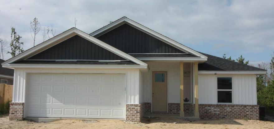Stunning New construction homes in a great location in Lynn Haven, Built by one of the areas most sought after builder. This home has a spacious floor plan, with custom cabinets, quartz counter tops, wood looking vinyl flooring, up graded light fixtures and all at an affordable price. attention to detail and beautiful craftsmanship, This home has 3 bedrooms 2 baths and an office. Come check it out today