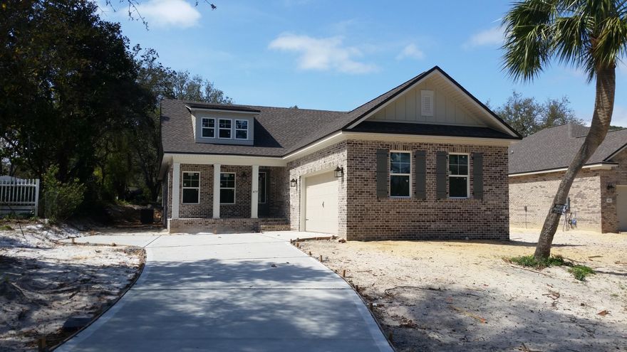 Rare New Construction Home in the Heart of Destin. Brick Exterior with Hardie Trim, Architectural Shingles, Vinyl Low E Windows, Porch Columns with Brick Accents, Impact Front Door and Two Car Garage. Open Floor Plan, 9' Ceiling Throughout, Oversized Baseboards and Trim, Faux Wood Laminate, Tile and Carpet, Granite Counters in Kitchen and Baths, Tiled Shower and Tub Deck in the Master Bath. These Homes Will Be Energy Efficient Gulf Power All Electric Earth Cents Energy Homes. Builder has over 38 Years Experience in This Area