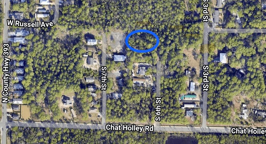 Ideally positioned between Destin and west Panama City, just south of Choctawhatchee Bay, this prime double-lot parcel off Chat Holly Road offers an outstanding new build opportunity in the rapidly growing Santa Rosa Beach area. Only minutes from the world-renowned 30A and the sugar-white sands of South Walton County, the property provides flexibility for residential development. Its corner lot is wooded on two sides-zoned for 2 units per acre, the oversized double lot can accommodate a large custom home or be split, allowing for two separate homes to be built. Buyer to verify all zoning, dimensions, and intended use.