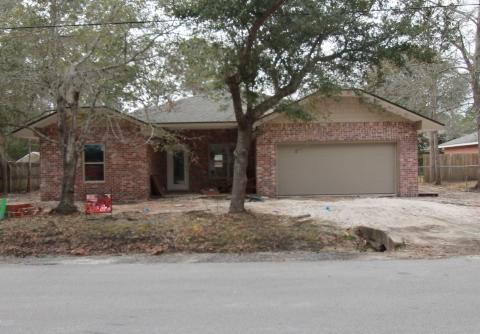 Awesome floor plan offered by 2017 Parade of Homes, winning builder! This 4/3 custom brick home has super curb appeal, and is being constructed on large lot. There are 10 Ft. Ceilings w/ impressive crown molding, tile flooring throughout the main living and wet areas, and 5 1/4'' baseboard, throughout. As you enter the home through the covered front porch, the formal dining room is on your right. As you continue down the hallway, you will then enter the chef's delight kitchen which boasts custom maple cabinetry, granite countertops, 2 large pantry's, and stainless appliances (including an oversized commercial grade frig./freezer).