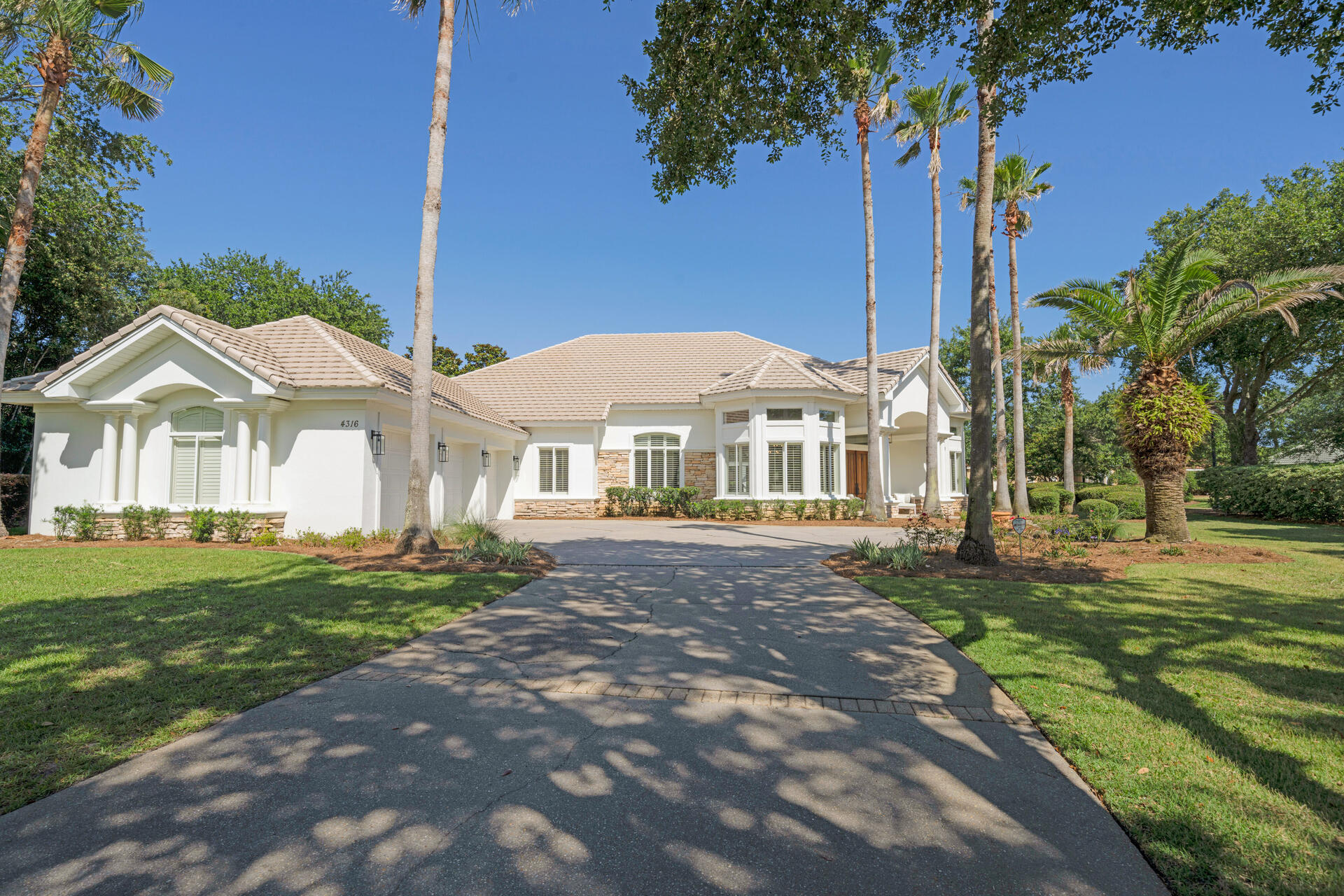 Welcome to the desirable neighborhood of Stonebridge, located in the gated community of Kelly Plantation! This beautiful 4 bed 4 bath home was completely renovated in 2022. Situated on a large corner lot, this home is sure to impress. As you enter the home you will notice the high ceilings with deep crown moldings and new LVP flooring throughout. The updated chef's kitchen features all new stainless steel appliances and Taj Mahal countertops. The master's retreat has an en suite bath with a new luxury tiled shower and freestanding tub. This home was built for entertaining with an enclosed lanai and pool area. Beautiful views of the enclosed pool are visible from the main living areas and the master bedroom. The pool's waterfall fountain provides a great relaxing spa ambiance. There is also an outdoor television for added entertainment while grilling or relaxing by the fire pit. This home has ample storage and a three car garage. Furnishings and golf cart are negotiable.