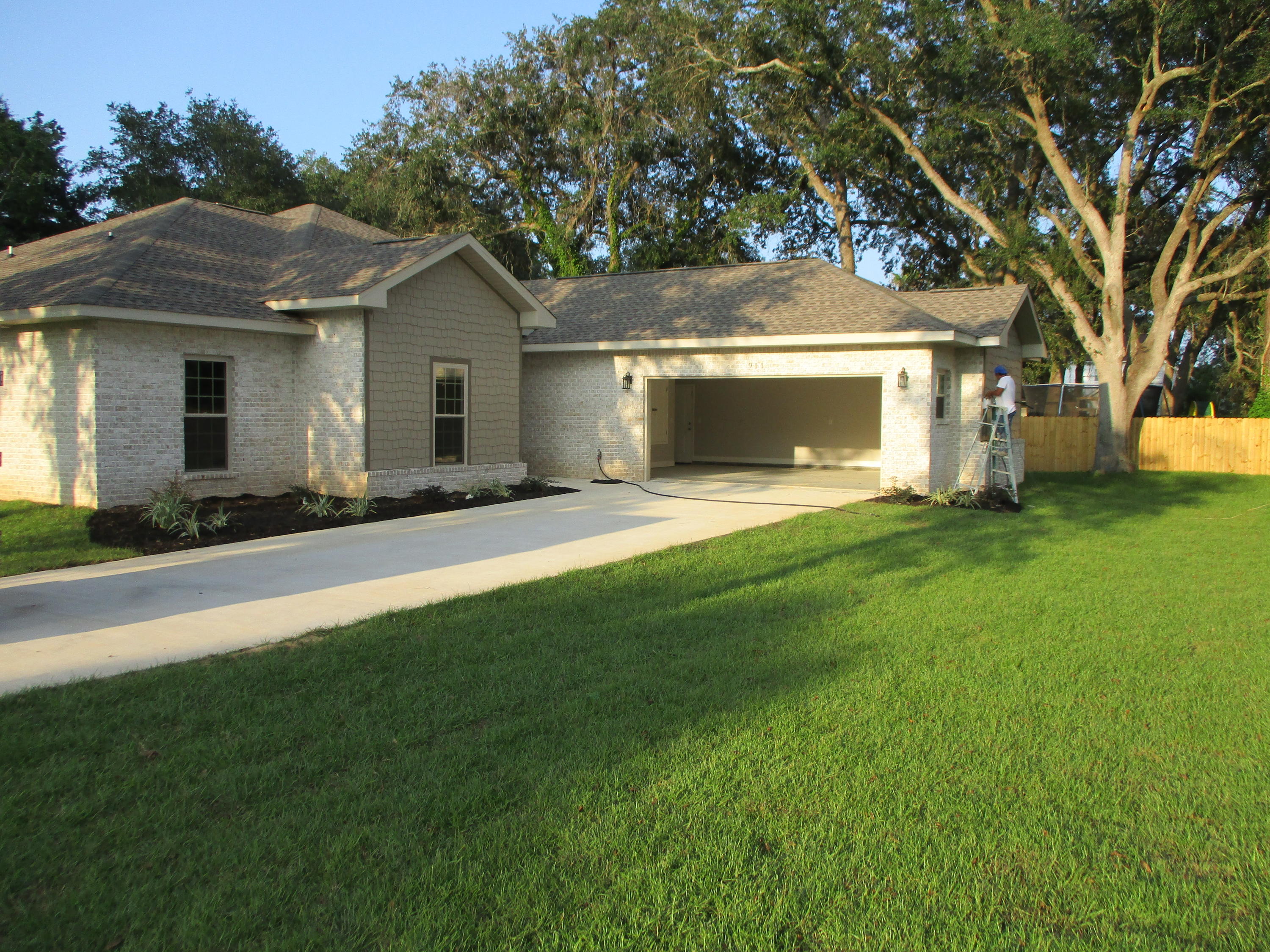 New construction, nearly ready for occupancy. Great location, located on a dead end private street on a large .3 acre lot. 9' perimeter ceilings, 10' ceilings in living area, treyed/coffered ceilings in living room and master bedroom. Large oversized 2 car garage, additional open attic storage area over garage. 5 1/4'' baseboards, crown moulding in living area and treyed ceiling, and cased windows. Dual vanities in both bathrooms. White shaker style cabinets, soft close doors/drawers, white Quartzite counters, Samsung stainless kitchen package, undermount sink. Cultured marble tub/shower in Jack and Jill bathroom, cultured marble garden tub in master bathroom, and walk in carrera tile shower/frameless glass door in master bathroom. All flooring is wood plank porcelain tile, no carpet