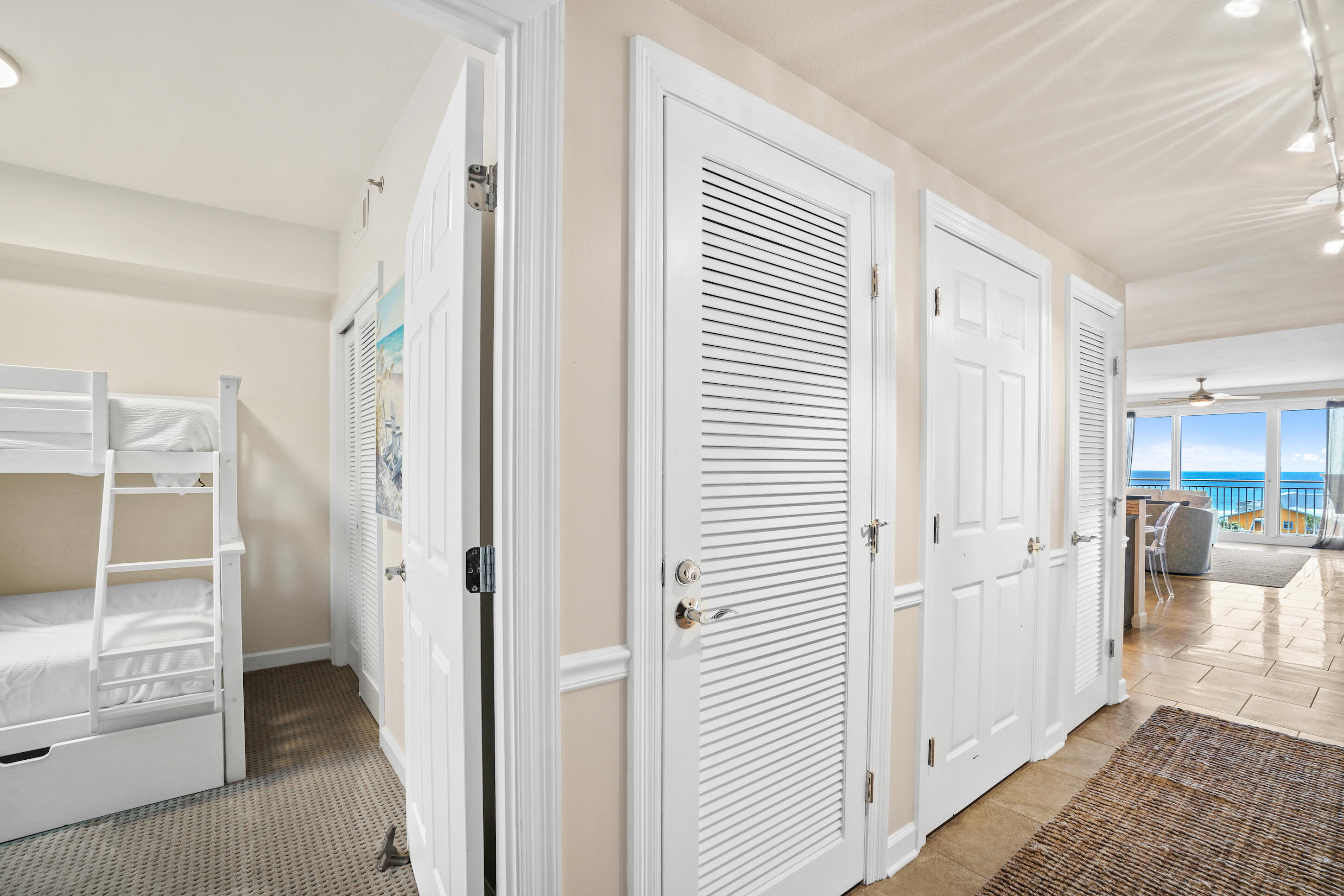 Deeded garage parking space & storage locker!! This unit will have done 108k in rental income from 2024 to the end of 2025 with plenty of time for more bookings! Coastal elegance meets unbeatable location in this 3BR/2BA condo at Sterling Shores! This spacious & stylish updated unit is offered fully furnished with high-quality furnishings in pristine condition. The open-concept living space flows seamlessly to a private balcony accessible from both the living room and the primary suite, offering stunning views of the Gulf and overlooking the sparkling lagoon-style pool. Inside, you'll find a chef's kitchen equipped with Sub-Zero appliances, modern cabinetry, quartz countertops, and a sleek tile backsplash. A full-size washer and dryer are tucked conveniently into a dedicated laundry room. The condo is also equipped with motorized hurricane shutters for convenient, push button storm protection. Sterling Shores offers...400 feet beach access, a massive 4,300 sqft zero-entry lagoon pool, a beachfront pool with Tiki bar and grill, a state-of-the-art fitness center, and a private theater room. Ideally located in the heart of Destin, this is coastal living at its finest!