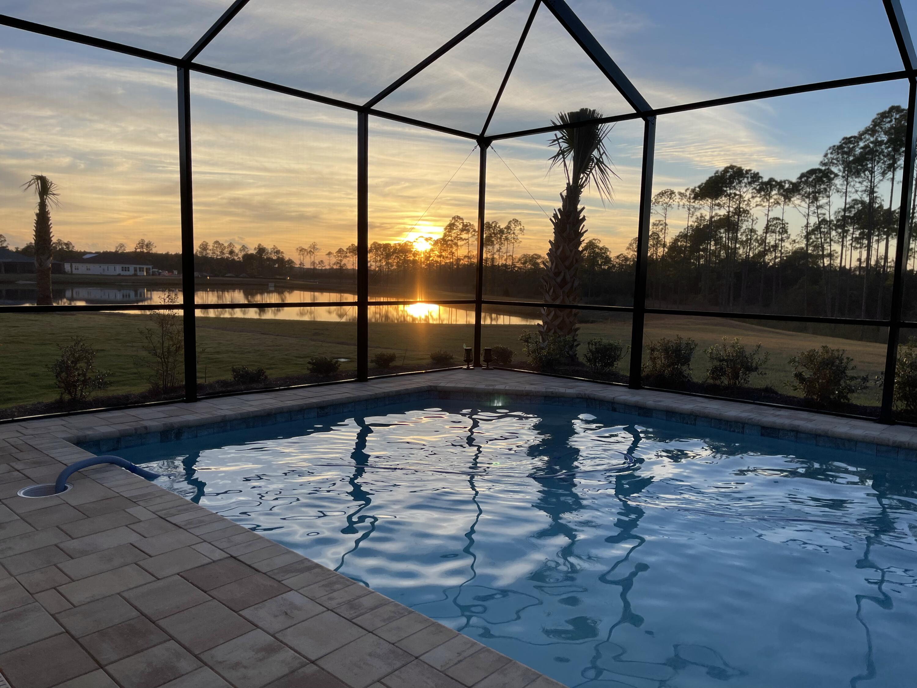 Professional photography coming soon!Your Coastal Paradise Awaits with a VIEW OF THE INTERCOASTAL!Discover your perfect retreat in the vibrant 55+ community of Margaritaville, in Panama City Beach! This inviting (Cabana floorplan) 3-bedroom, 2.5-bath home also features a spacious den, ideal for a home office or hobby space. Experience breathtaking sunsets from your covered lanai and private pool, overlooking a tranquil backyard with a picturesque VIEW of the INTERCOASTAL WATERWAY!! The generous 2-car garage provides plenty of storage for your beach essentials. Enjoy an active lifestyle in this delightful community, boasting amenities and a friendly atmosphere. Don't miss out on this amazing opportunity to embrace coastal living at its finest! Come enjoy living nestled among all the Emerald Coast has to offer and enjoy all the amenities that are just a short walk or golf cart ride away! The beautiful Town Square offers world class amenities including, an on site restaurant, a resort-style pool, social gathering areas, tiki huts, bocce ball, putting green, table tennis and even a dog park , just to name a few! The indoor and outdoor athletic facilities include tennis and pickleball courts and a top of the line fitness center. Don't wait and start enjoying island life living in this amazing 55+ community that is less than 10 min. from the airport!! WITH A FUTURE MARINA ON THE INTERCOASTAL AND THE ST. JOE COMPANY, TALLAHASSEE MEMORIAL HEALTHCARE AND THE FLORIDA STATE UNIVERSITY COLLEGE OF MEDICINE ANNOUNCING THEIR DEVELOPMENT OF A HEALTH CARE CAMPUS ONLY A FEW MILES AWAY, THIS IS THE PLACE TO LIVE!!