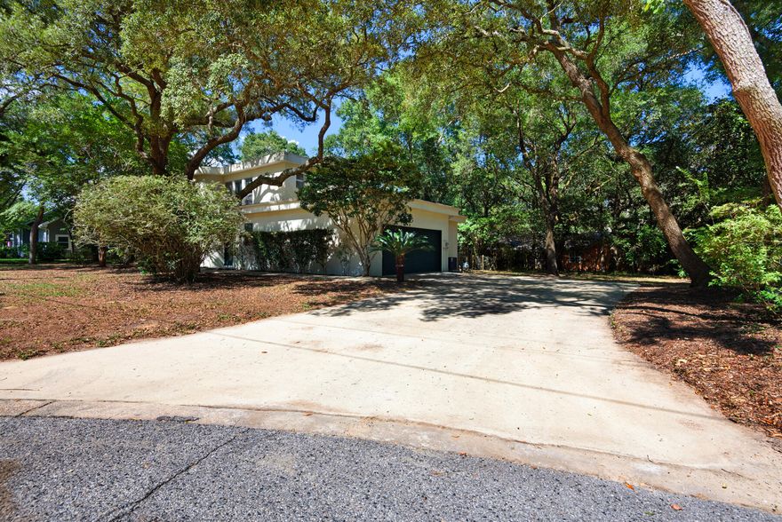 Welcome to this custom-built, open-concept home on beautiful Woodbriar Court! Located in the highly desirable Kenwood area and nestled on a .34-acre lot with mature oak trees, this home offers the perfect mix of comfort, style, and space.  Inside, you'll find three large bedrooms, each with its own private bath, including a main-level master suite. The spacious kitchen connects to a formal dining room and a heated and cooled Florida room, creating extra living space that's perfect for entertaining or relaxing. Enjoy soaring ceilings, plenty of natural light, and an open, airy feel throughout the home. Important updates include two high-efficiency HVAC systems (2020) and a gas water heater (2022). Property is just a short golf cart drive away from nearby Eldredge park on Chula Vista bayou.