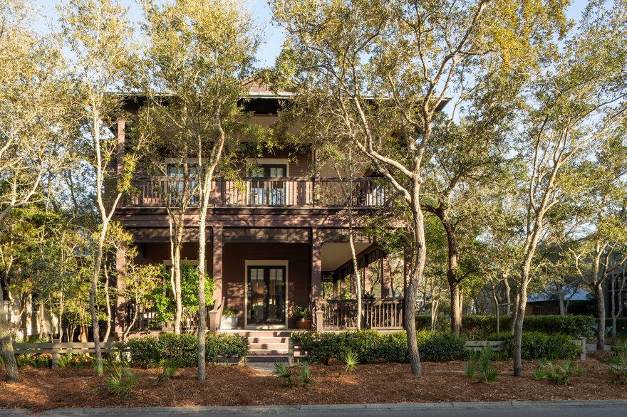 Location, Location, Location. 1 block from Watercolor Beach Club. Imagine living in one of the most desirable locations in Watercolor! Custom built by award wining architect Geoff Chick. Large corner lot featuring over 1500 sq.tt. of wrap around covered porches. Home has been meticulously maintained - never rented. This tasteully sold furnished 3 bedrooms each have their own en suite bath with bunk room. Additionally, there is extra space above the 2 car attached garage. Kitchen featuring unique custom wood   banquette seating nook to dramatically elevate your dining experience. Beautiful wood floors through out the home. Large living area surrounded by glass doors opening up to the covered porches, for dining and entertaining. All come together in this special Watercolor offering!