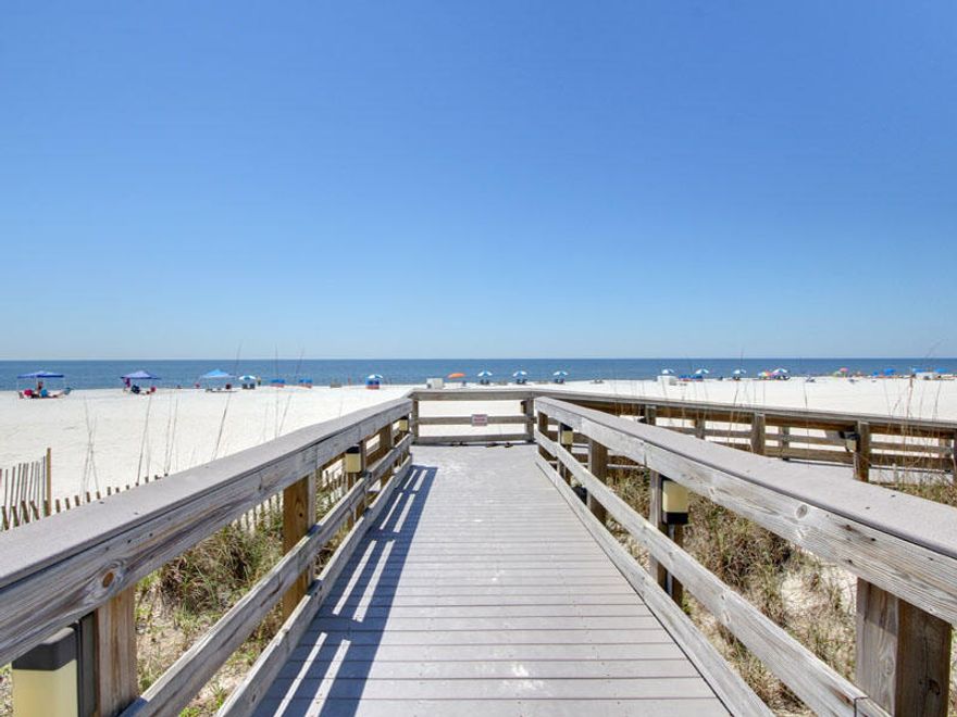 Experience the ultimate beachfront living in Orange Beach! This fully furnished 3-bedroom, 2-bath condo, situated 12 stories above the picturesque Gulf of Mexico, offers breathtaking views & a plethora of updates, ensuring a modern & luxurious living experience. This beach abode provides ample space for your family and friends, accommodating up to 7. The completely renovated kitchen is a chef's dream, equipped with stainless steel appliances, new cabinets & new granite countertops. Additional updates include granite countertops in the bathrooms, smooth ceilings throughout and new furnishings! Convenience is key, & this property offers an in-unit washer & dryer for your added comfort. Step onto the extra-large balcony with an outside sectional & the dining set, & immerse yourself in the