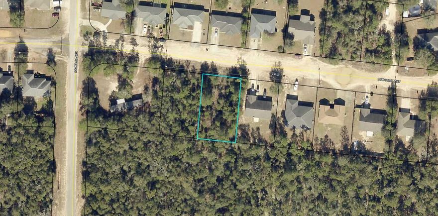 Nice wooded lot in Pines Subdivison near Crestview with community water and requires septic tank.
