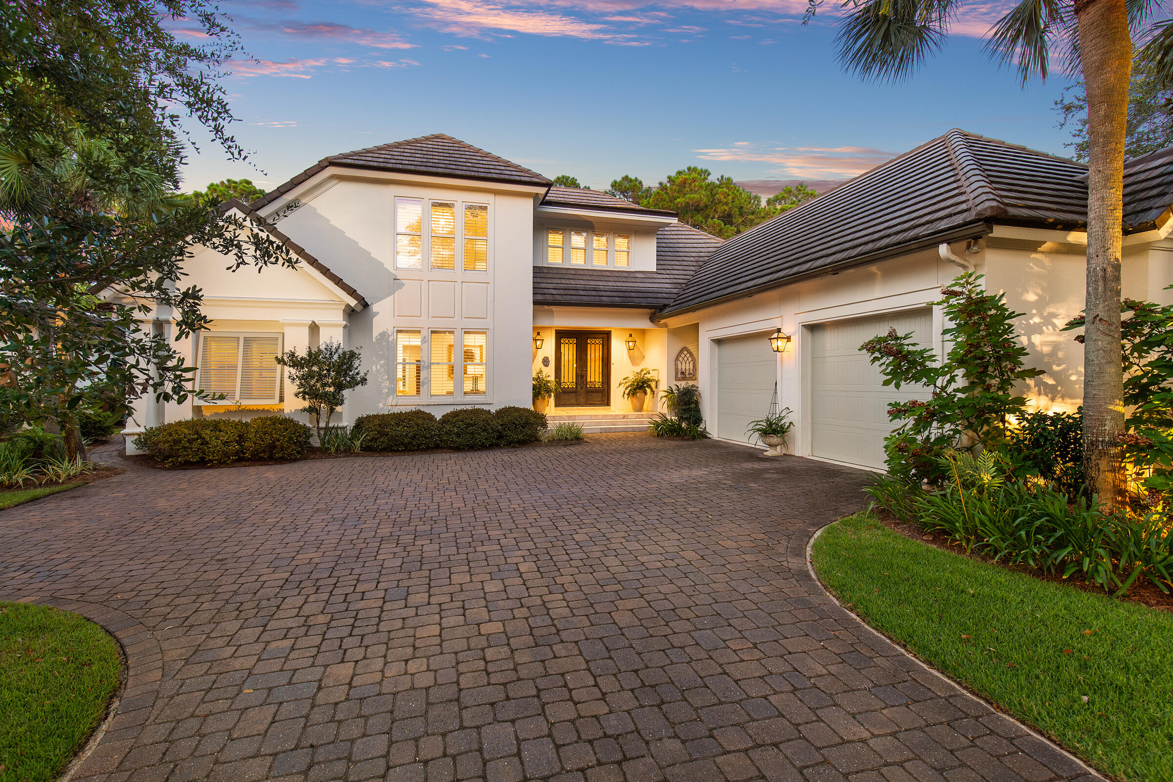$150,000 price reduction. MOTIVATED SELLER. This stunning Huff Homes design is in the exclusive community of Burnt Pine, offering wonderful views of the 11th tee box, a golfer's dream. High ceilings & travertine flooring create an airy, elegant ambiance. The chef's kitchen serves as the heart of the home with a two-sided gas fireplace, brick-and-mortar accents, new undermount lighting, stainless appliances, a 6-burner Dacor cooktop, WiFi-enabled oven, granite countertops, & an oversized island with additional sink, wine cooler & ice maker. Pass through French doors to enjoy an oasis-like pool & beautiful lawn with renovated irrigation system. Additional features include recirculating hot water, large closets, fresh Elastomeric paint, & an oversized garage with a separate golf cart garage. Enter through the stately metal front doors into a vaulted foyer and formal living area with gas fireplace. Enjoy the company of friends and family in the open concept kitchen, dining, and family room. Chef's island kitchen is warm and inviting with a gas fireplace and brick and mortar accents. Expansive windows throughout the home flood the space with natural light, creating a bright and inviting atmosphere.
Designed for comfort and luxury, the home boasts four en-suite bedrooms with updated bathrooms, including the primary suite with a spa-like experience. The primary bathroom features Quartz countertops, dual vanities, a walk-in tiled shower with dual shower heads, a towel warmer, a private water closet, and custom his-and-hers closets with built-in dressers and pull-down racks for extra hanging space. Motion-sensor lighting enhances the convenience of large closets throughout the home. Guest baths are updated with custom tile and beautiful accents.
The home is equipped with an alarm system for added security and an instant hot water recirculation system. Bose speakers throughout the living spaces, kitchen, and back porch create an immersive audio experience. A luxurious 8,000-gallon pool provides a private oasis for relaxation and entertainment. Outdoor shower and mini outdoor kitchen installed for added convenience. The brick paver driveway leads to an oversized 2 car garage plus an additional golf cart garage with a dedicated workshop space and a storage closet.
Nestled within the 2,400-acre Sandestin Beach Resort, residents enjoy world-class amenities, including 73 holes of championship golf, tennis and pickleball courts, fishing, a 98-slip marina, scenic nature and biking trails, a full-service health club and spa, golf-cart-friendly pathways, as well as an array of restaurants, entertainment venues, playgrounds, and more.
