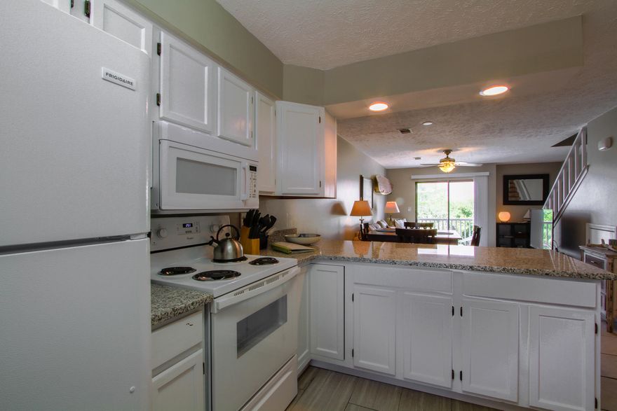 THIS IS A CASH COW. Projected to do over $53,000 this year in gross rental income. Over $37,500 in Gross Rentals last year. This unit has been updated. The cabinets have been painted and granite installed in the kitchen. Each bedroom upstairs has it own private bathroom. New vanity in the upstairs guest bathroom. Newer windows through out the condo. Washer and Dryer. Fully furnished and rental ready. This unit has a loft in the guest bedroom. Great space for kids or additional storage. New roofs are going on Now. Kitchen window has been ordered. A/C unit installed in 2017.