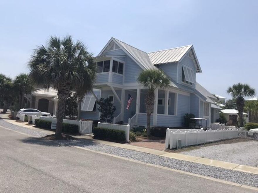 This house is a rare 4 bedroom, 4 bath home with two bedrooms and baths on the primary floor - the perfect vacation beach home, primary residence, or investment property.  The property is impeccably cared for and move-in ready - being sold furnished with a small exclusions list.  A large screened-in porch adjoining the living/dining/kitchen area creates the perfect spot for alfresco dining and relaxation.  Children's room with under eave play spaces is a favorite spot for hours of entertainment. Each bedroom has its own private porch.  The back yard of the home is a landscape paradise with luscious plantings, paved patio, outdoor kitchen, and fireplace.  Do not miss a great opportunity to own this lovely family beach house.