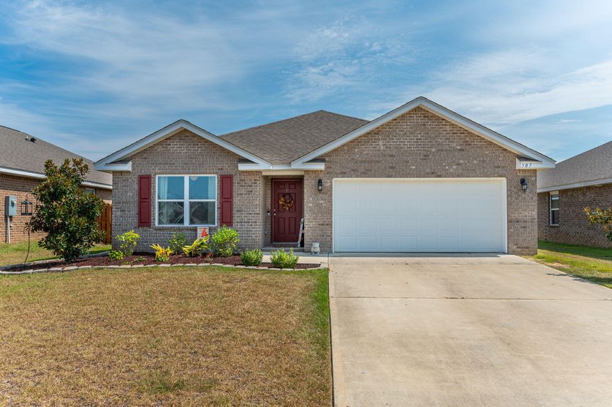 MOTIVATED seller will contribute up to 3k in closing costs/rate buydown! This Redstone Commons beauty has carefree LVP in main areas with cozy carpet in the bedrooms. The primary en suite has tons of closet and vanity space, a large soaking tub, and separate shower. There's lots of natural light in the living area and kitchen, featuring granite countertops, stainless appliances, an island/breakfast bar, huge pantry. The back door opens to a covered porch and a vast greenbelt behind your property for tranquil privacy. Your amenity key accesses 2 sparkling community pools, the fenced Dog Park, playground, and outdoor kitchen at the Clubhouse. The elementary and middle schools are across the street and you're just 40 minutes from the white sand and emerald waters of the Gulf of Mexico.