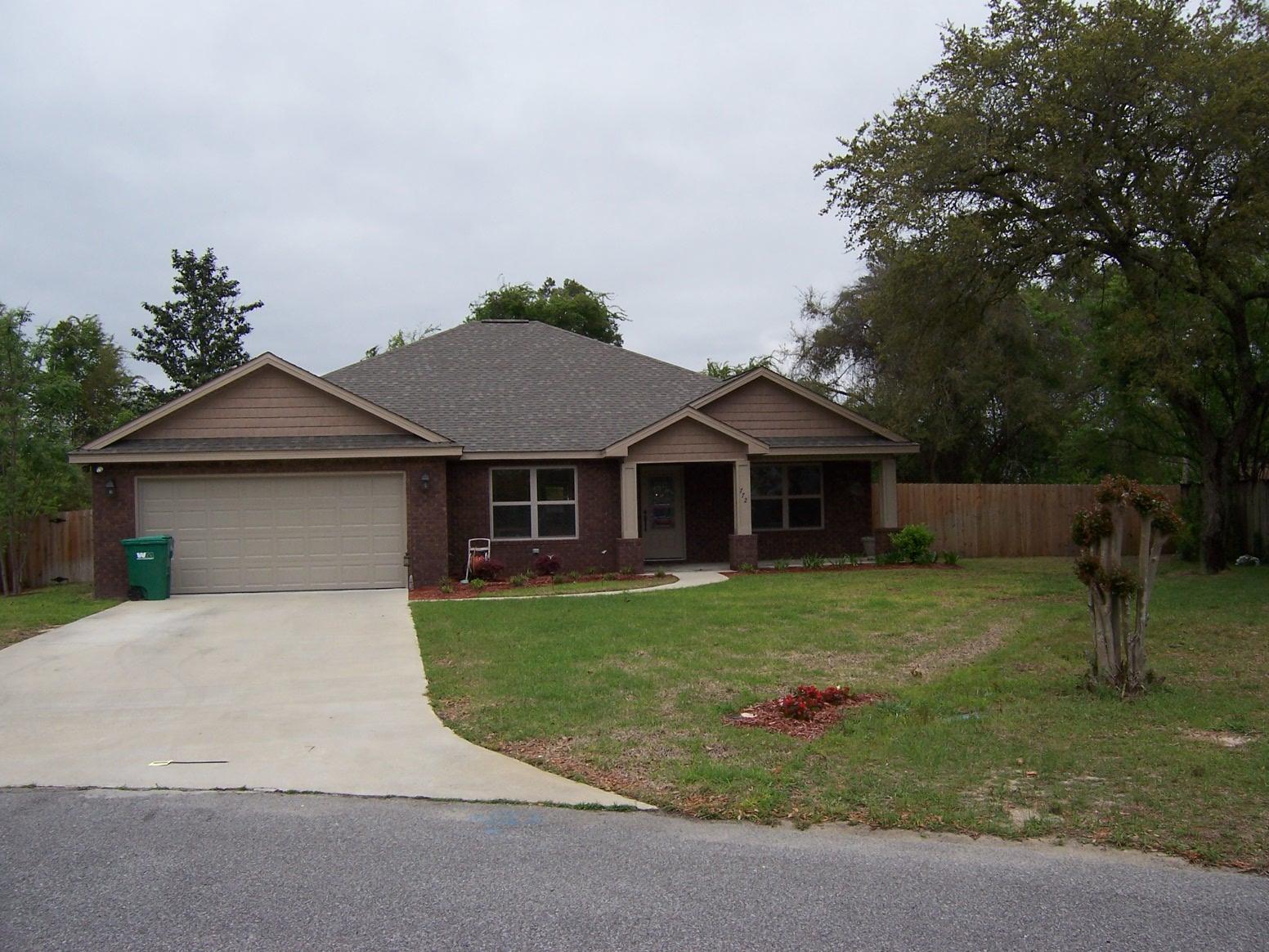 Located in Bluewater Bay, Large Cul-De-Sac Fenced yard. Large front covered porch. Tile Entrance Hall opens to Spacious Living Room with door opening to Large Cover patio in Fenced Back yard. To left of Entrance is Dining Room, opens to Beautiful appointed Kitchen. Granite Countertops in Kitchen and Matching tops in both Bathrooms. Stainless Steel kitchen appliances(Side by Side Refrigerator). Pendant type lights over Breakfast Bar and recessed lights in kitchen,living room. Split Bedroom plan. Porcelain 20'' floor tile throughout, except carpeted bedrooms. Master Bedroom with Master Bath, garden tub, separate shower, double vanities. Other two bedrooms share a full bath. Home is wired for Generator use. Hurricane Shutters. NON SMOKING. SMALL PET CONSIDERED WITH OWNER APPROVAL.
