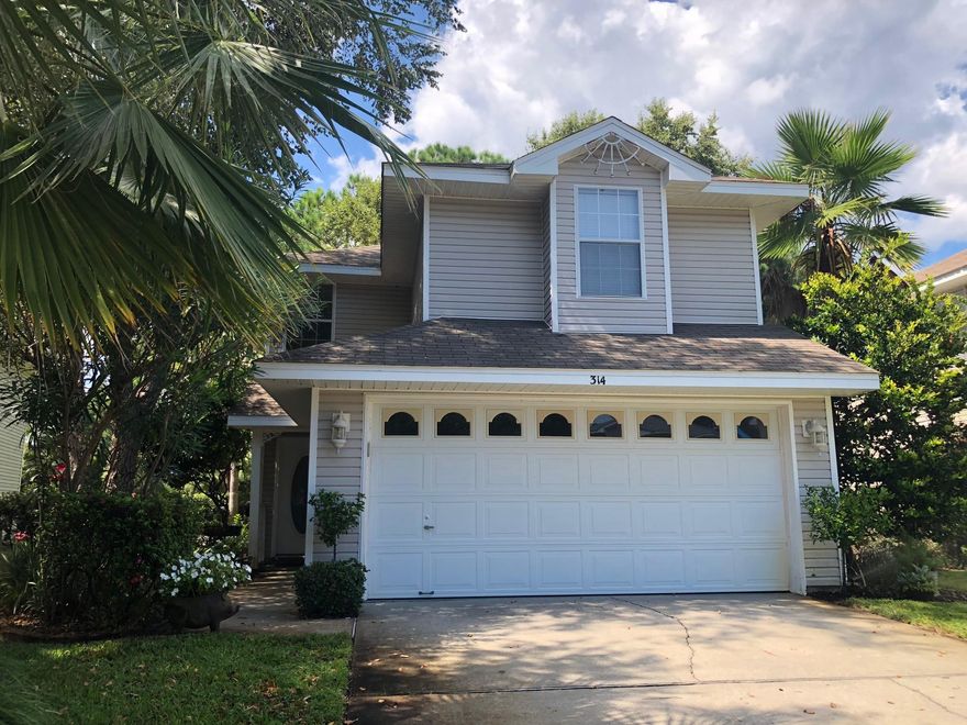 LAKE FRONT home in the heart of Destin! Ideally located, this home is minutes from beaches, shopping, dining, and other local attractions. Attention to detail is evident throughout this immaculately kept and completely updated home. The kitchen features new wood cabinets and hardware, new granite countertops, new pendant and recessed lighting, and custom built-in shelving and new chandelier in dining area. Other recent upgrades include: new flooring and baseboards downstairs, new tile shower in the upstairs hall bathroom, new storm door on the back patio door, and new water heater (Aug). HVAC unit replaced 3 years ago. Whether enjoying the fall evenings by the fire pit, kayaking on the lake, fishing, or a walk to the playground, you will feel at home in this highly desired neighborhood!