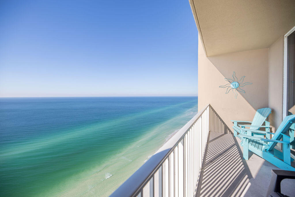 Welcome to Paradise!  This stunning Penthouse level unit features 2-bedroom, 3 bathroom, 1,131 square foot Gulf front unit with bunk room at Tidewater Beach Resort offers the ultimate beachfront living experience.  With breathtaking views of the Gulf of Mexico and top notch amenities, this is your chance to own a piece of Florida's coastal paradise.  Enjoy panoramic views of the Gulf of Mexico from your private balcony all day every day.  Watch dolphins play in the emerald waters and witness mesmerizing sunsets right from your living room.  This unit is meticulously maintained and offers 1,131 sq ft of living space.  Each bedroom has it's own en-suite bathroom,  sleeps 8 with the sleeper sofa in the living room. Covered garage parking and a short walk to Pier Park Shopping Center.