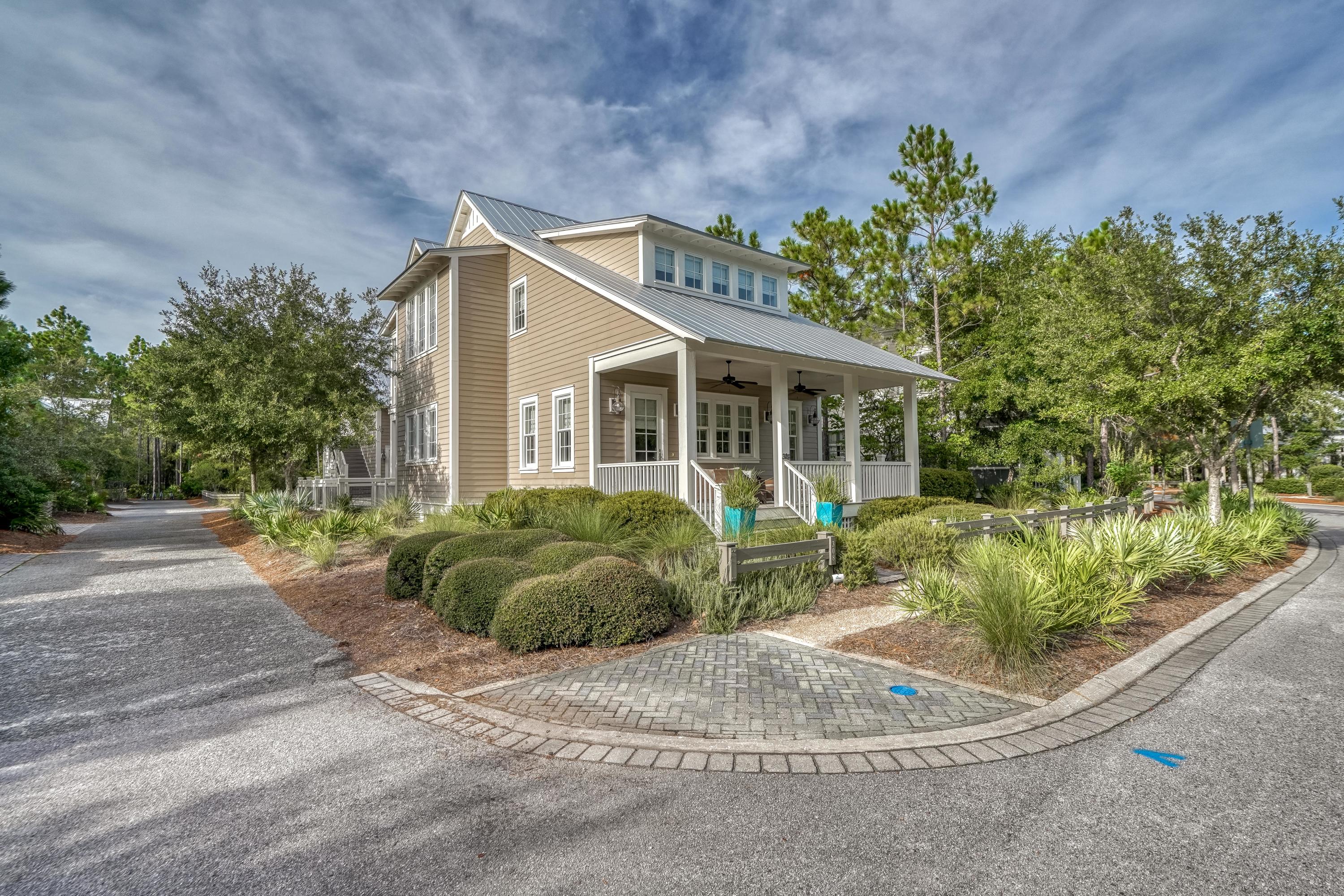 308 Pine Needle is light, bright, and inviting as you enter this Beach Chic Home with 4 bedrooms plus a bunk area and 5 full baths. The open floor plan invites family and friends to gather and enjoy all Watercolor and the Beach has to offer. The over-sized lot provides great outdoor space with a pool and firepit patio along with a large dining porch. The 2 car garage with Carriage House has an additional king bed along with living space and Kitchenette. The main house has a guest bedroom on the first floor. Upstairs there are 2 king bedrooms with private baths and tv room with bunks with a full bath for the area. Thermador Appliances and quartz countertops makes the kitchen easy and efficient, and there is a screened porch off the master bedroom! This is it...Watercolor at its best!