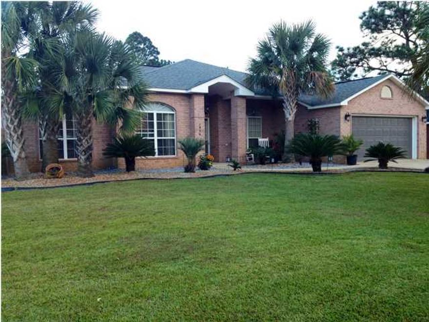 Welcome home! This well maintained, beautifully landscaped home is ready for a new family. There are 4 large bedrooms and 3 full bathrooms. The master bedroom is fabulous, measuring just over 18x17 ft, has a much desired tray ceiling, and a large master bath with 2 walk in closets. The kitchen is spacious, with beautiful cabinets and a a bright eat- in kitchen. There is also a gorgeous formal dining room, a beautiful and spacious living room and a separate and elegant den/office. Off the living room, there is a very large screened in porch, set on original concrete slab. Off the porch, there is a large deck, and also a paver patio. The large fenced in back yard boasts fruit trees, and plenty of room for entertainment. Enjoy the large 2 car garage with automatic door. There is almost