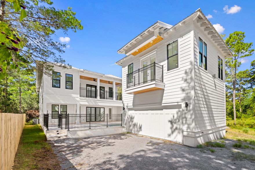 Welcome to 91 Spooky Lane--a brand new, masterfully crafted coastal retreat on the prestigious west end of 30A, perfectly located just a short walk from the pristine sands of Santa Rosa Beach. This residence epitomizes luxurious coastal living, with every element thoughtfully curated in one of 30A's most coveted locations.Stepping inside, the main floor immediately impresses with its elegant shell stone tile, creating a cool, natural ambiance throughout. The primary suite on the main level serves as a private sanctuary, complete with a spacious walk-in closet and a spa-inspired en-suite, offering a serene retreat after a day on the beach. The open-concept living area, centered around a custom fireplace, flows seamlessly into a chef's kitchendesigned for both culinary excellence and stylish entertaining.
On the upper level, each bedroom opens onto a private balcony, providing tranquil outdoor spaces to enjoy the coastal breeze. An upstairs wet bar adds a touch of luxury, enhancing the home's entertaining capabilities, while a spacious bunk room offers versatility for family and friends.
Outdoors, a sparkling pool and expansive patio provide the ideal setting for relaxation or memorable gatherings. A detached carriage house with a private 1-bedroom, 1-bathroom suite offers an additional level of comfort and privacy for guests.
With its close beach access and proximity to the vibrant Gulf Place, 91 Spooky Lane represents a unique opportunity to enjoy the best of 30A livingwhere modern luxury meets the unmatched beauty and lifestyle of Santa Rosa Beach.