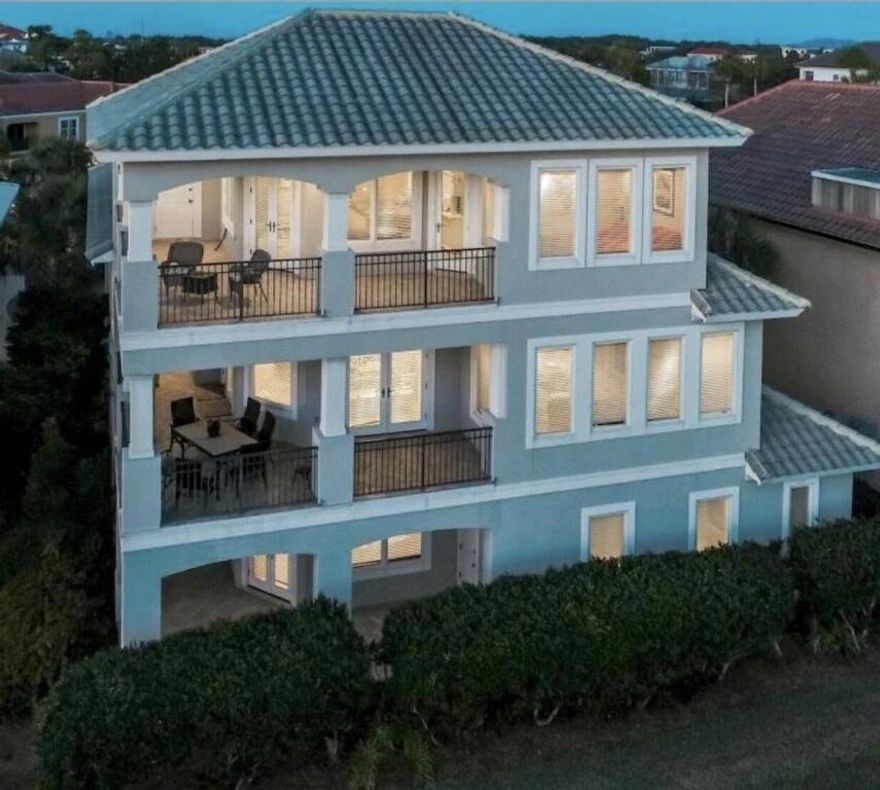 Exceptional opportunity abounds with this gorgeous 4,339 sqft, 5 bedroom rental machine ideally located on Scenic Highway 98 within the prestigious gated community of Destiny East. Expertly positioned, this outstanding property takes full advantage of gorgeous gulf view corridors and close proximity to the lakefront community pool & beach access. This rental magnet scales three stories in height and conveys fully furnished with recent updates including all new interior paint & professional decor as well as fresh landscaping. Notable features include a private elevator, spacious open floor plan, two car garage with a third golf cart parking stall, chef's kitchen complete with stainless steel appliances, granite countertops and custom cabinetry. Oversized wrap around balconies characterize
