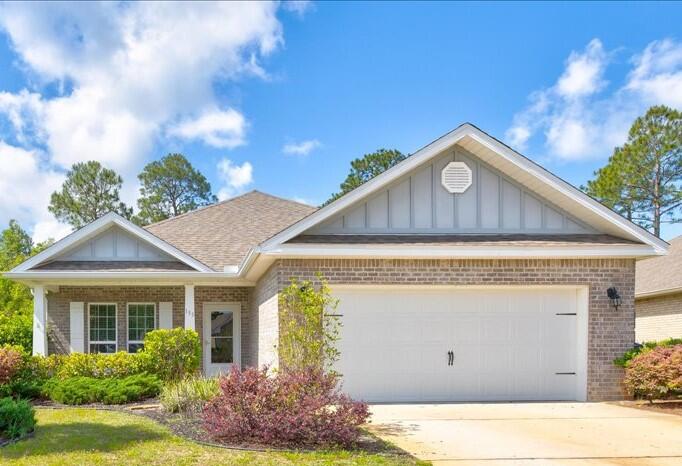 Watch the birds chirp as you swing on  your front porch from this lovely four bedroom home in the desirable Passages of Hammock Bay.  You'll love the open floor plan with white cabinets, roomy pantry, granite countertops, and screened back porch. Enjoy your private and serene backyard with a massive shed for all your storage needs. It would also make a fabulous she-shed or man-cave.