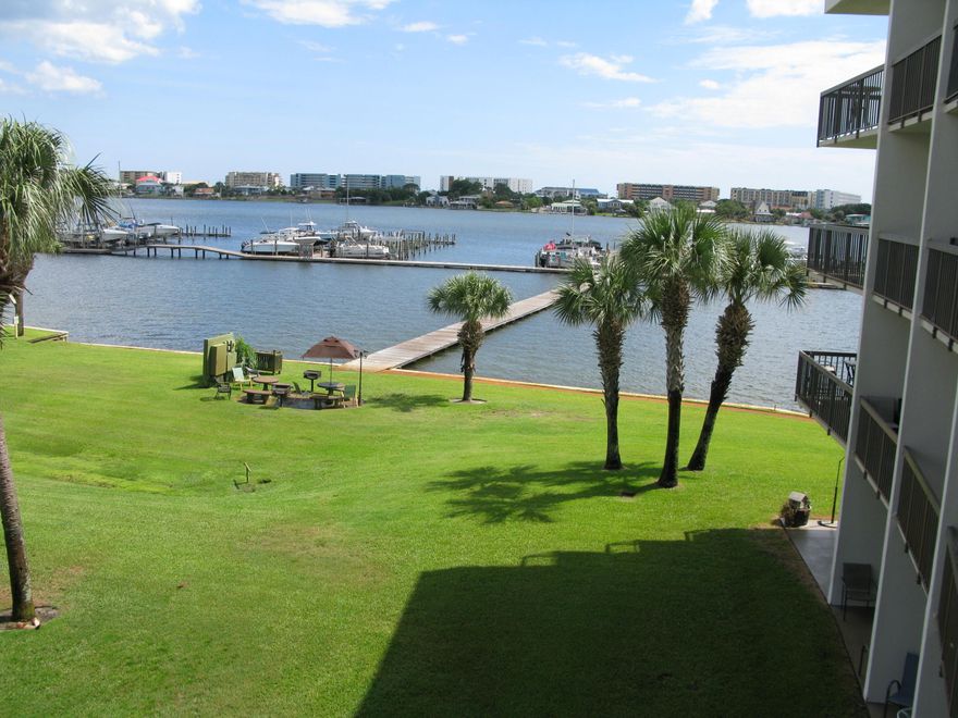 This property is a perfect rental and has a boat slip! Very livable.Very comfortable living area , sleeping area and kitchenette area. Updated Bath. Great Weekend getaway. Pirates Bay Condos is very livable with a terrific water view. Boat Slip is just a added bonus! Located in the Heart of Fort Walton Beach.  Shopping and Restaurants are nearby.. Deeded Boat Slip is E14.