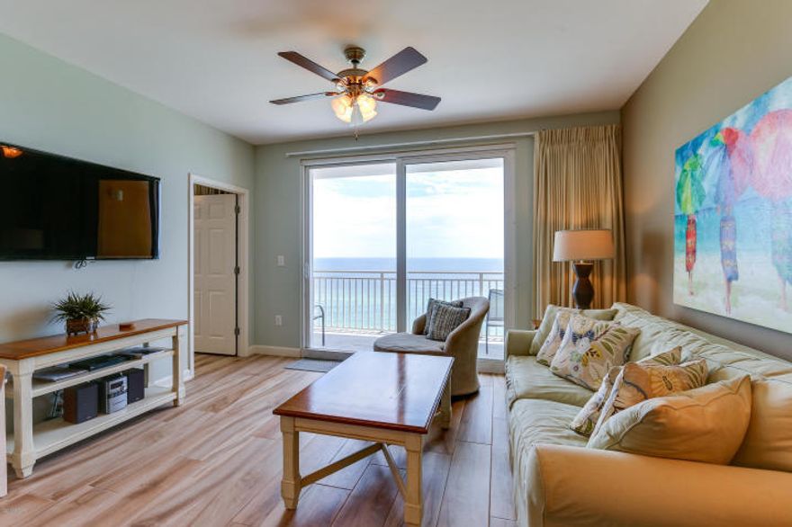 The best of the beach at Splash, located on the West end of the gorgeous beaches of Panama City. Hands down the nicest property in the development. This professionally decorated, freshly painted, Wave floor plan is in pristine condition and has been upgraded with new wood-look ceramic tile floor and new furnishings throughout. The condo features a gulf front master bedroom with balcony access and an open concept living/kitchen with balcony access as well. The custom walk in shower in the master suite and custom tile work in the guest bath really set this property apart. This unit is a POWERHOUSE RENTAL!! This prime 7th floor location is the ideal elevation in the stack which means more convenience and greater demand from a renters!