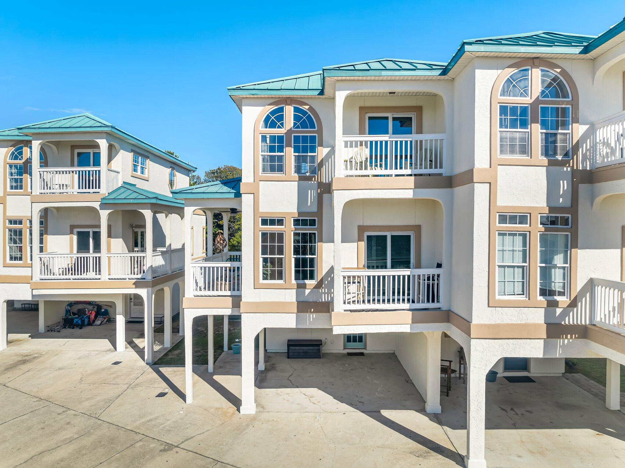 Beachfront Bliss in Panama City Beach.Welcome to 17878 Front Beach Road, Unit E2--your perfect slice of paradise! This charming two-story beachside retreat offers the ultimate coastal lifestyle, with stunning Gulf views and direct access to the sugar-white sands of Panama City Beach.Recently refreshed with a stylishly painted exterior, this townhome radiates curb appeal and sets the tone for relaxed beach living. Step inside to discover a bright and airy open floor plan, ideal for hosting friends and family after a day by the water. The main level features a fully equipped kitchen, a spacious living area, and sliding glass doors that lead to a private patio, where you can enjoy breathtaking sunsets over the Gulf. Upstairs, two generously sized bedrooms provide cozy retreats, each with ample natural light and storage. The primary suite even boasts its own balcony, perfect for morning coffee with a view.

Located just moments from world-class dining, shopping, and entertainment, this property is an excellent choice for a full-time residence, vacation home, or lucrative short-term rental investment.

Don't miss your chance to own a piece of beachfront paradiseschedule your private tour today!