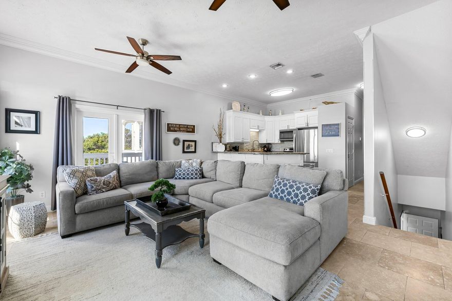 Beachfront Bliss in Panama City Beach.Welcome to 17878 Front Beach Road, Unit E2--your perfect slice of paradise! This charming three-story beachside retreat offers the ultimate coastal lifestyle, with stunning Gulf views and a three minute walk to the sugar-white sands of Panama City Beach.Recently refreshed with a stylishly painted exterior, this townhome radiates curb appeal and sets the tone for relaxed beach living. Step inside to discover a bright and airy open floor plan, ideal for hosting friends and family after a day by the water. The main level features a fully equipped kitchen, a spacious living area, and sliding glass doors that lead to a private patio, where you can enjoy breathtaking sunsets over the Gulf. Upstairs, two generously sized bedrooms provide cozy retreats, each with ample natural light and storage. The primary suite even boasts its own balcony, perfect for morning coffee with a view.

Located just moments from world-class dining, shopping, and entertainment, this property is an excellent choice for a full-time residence, vacation home, or lucrative short-term rental investment.

Don't miss your chance to own a piece of beachfront paradiseschedule your private tour today!